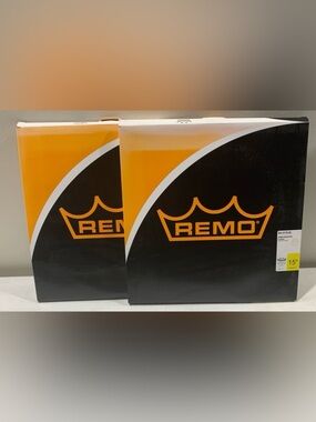 Two New Remo Ambassador 15” coated batter drum heads